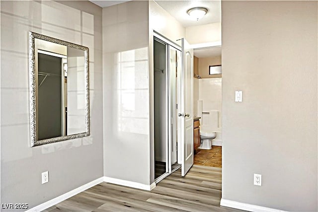 2101 Sealion Dr Unit 108, Las Vegas, NV 89128 - hall with wood finished floors and baseboards