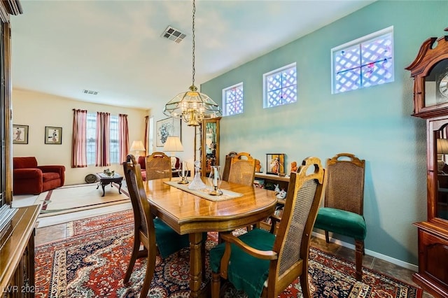 3624 Snowy Pines St, Las Vegas, NV 89147 - dining space with a chandelier and plenty of natural light
