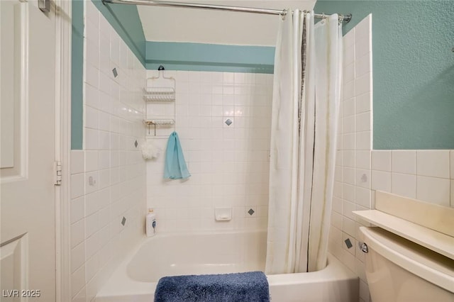 3624 Snowy Pines St, Las Vegas, NV 89147 - bathroom featuring shower / bath combo with shower curtain and tile walls