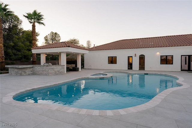 7745 Radcliff St, Las Vegas, NV 89123 - swimming pool with a gazebo, a patio, an outdoor kitchen, and an in-ground hot tub
