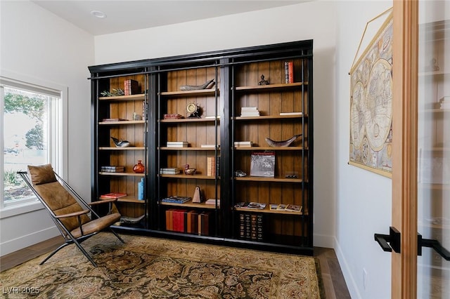 7745 Radcliff St, Las Vegas, NV 89123 - living area featuring wood finished floors and baseboards