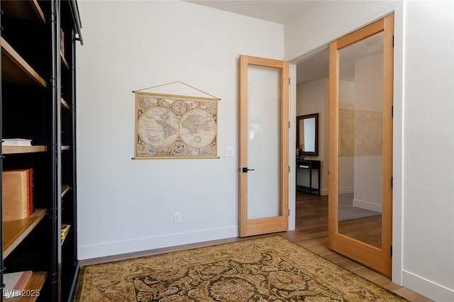 7745 Radcliff St, Las Vegas, NV 89123 - unfurnished office featuring wood finished floors and baseboards