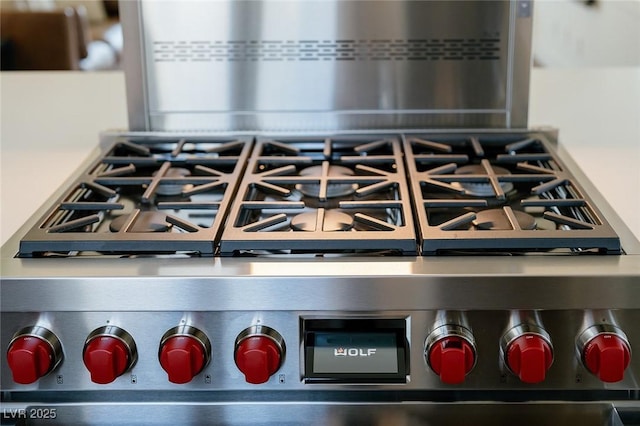 7745 Radcliff St, Las Vegas, NV 89123 - kitchen view of stainless steel range and backsplash