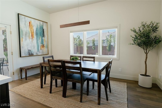 7745 Radcliff St, Las Vegas, NV 89123 - dining area with wood finished floors and baseboards