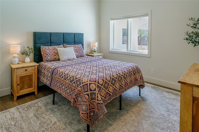 7745 Radcliff St, Las Vegas, NV 89123 - bedroom with baseboards and wood finished floors
