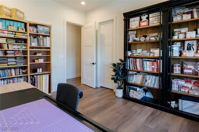 7745 Radcliff St, Las Vegas, NV 89123 - office space featuring wood finished floors and recessed lighting