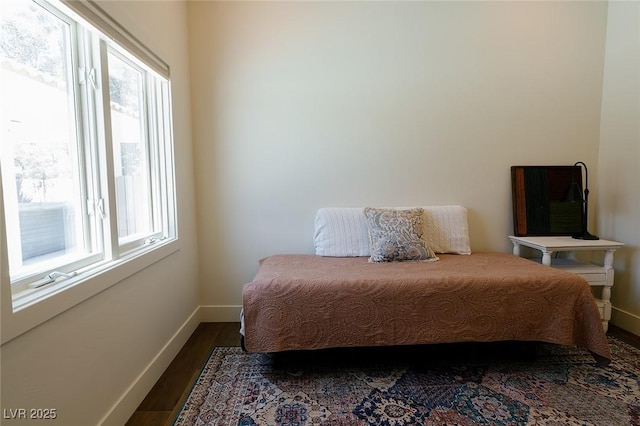 7745 Radcliff St, Las Vegas, NV 89123 - bedroom with baseboards and dark wood-style flooring