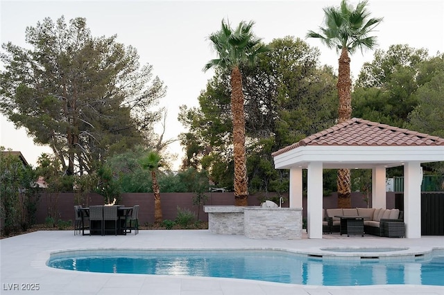 7745 Radcliff St, Las Vegas, NV 89123 - view of pool featuring a gazebo, an outdoor living space, a patio, and an in-ground hot tub