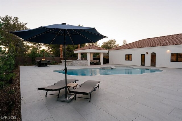 7745 Radcliff St, Las Vegas, NV 89123 - view of pool featuring a gazebo, a patio area, and a pool with connected hot tub