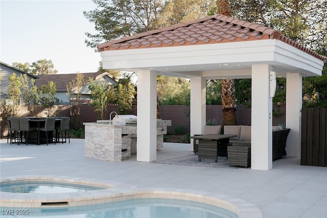 7745 Radcliff St, Las Vegas, NV 89123 - view of swimming pool featuring a gazebo, a fenced backyard, outdoor lounge area, a patio area, and area for grilling
