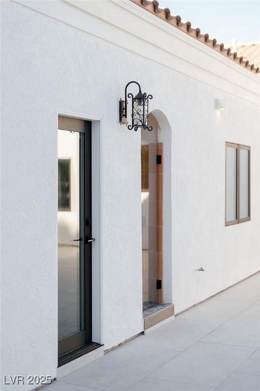 7745 Radcliff St, Las Vegas, NV 89123 - doorway to property featuring stucco siding