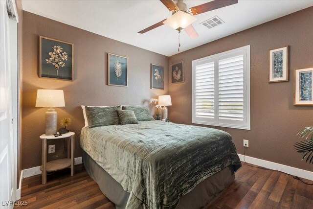 8013 Green River Knob St, Las Vegas, NV 89113 - bedroom with wood finished floors and ceiling fan