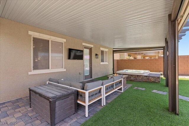 8013 Green River Knob St, Las Vegas, NV 89113 - view of patio with an outdoor hot tub and an outdoor living space