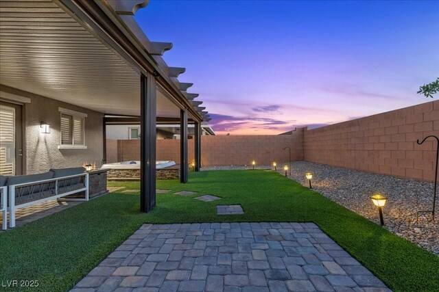 8013 Green River Knob St, Las Vegas, NV 89113 - fenced backyard with a patio area