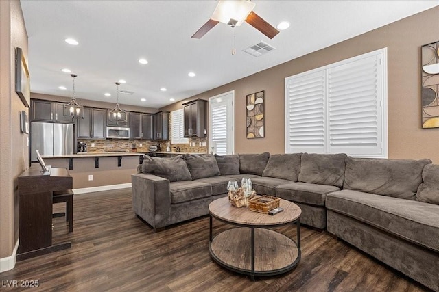8013 Green River Knob St, Las Vegas, NV 89113 - living area with a ceiling fan, dark wood finished floors, and recessed lighting