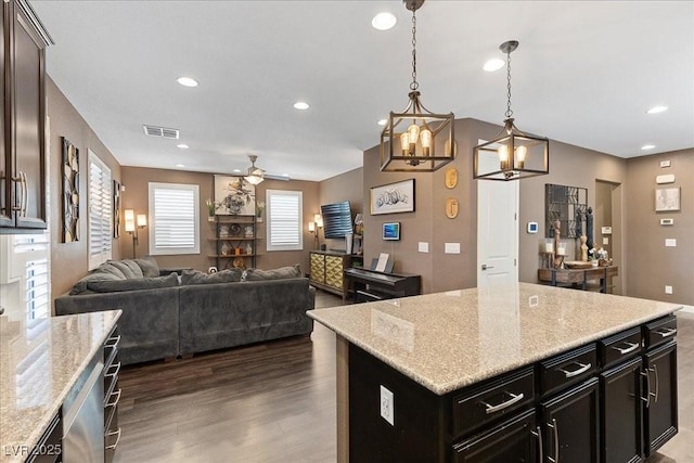 8013 Green River Knob St, Las Vegas, NV 89113 - kitchen featuring open floor plan, dark wood-type flooring, ceiling fan, a chandelier, and recessed lighting