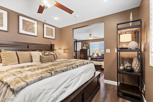 8013 Green River Knob St, Las Vegas, NV 89113 - bedroom with dark wood-type flooring, recessed lighting, and a ceiling fan