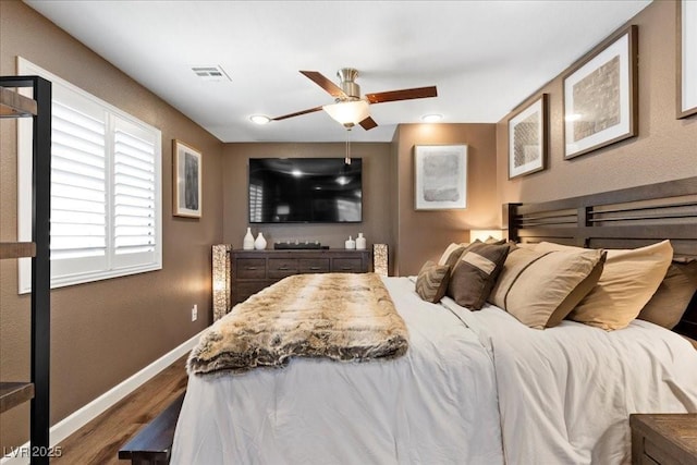 8013 Green River Knob St, Las Vegas, NV 89113 - bedroom with wood finished floors and ceiling fan