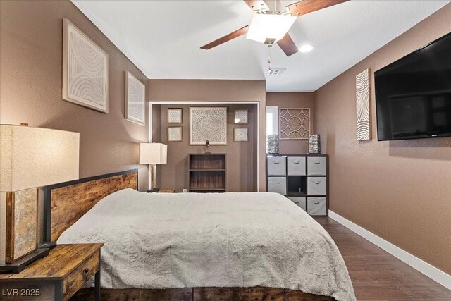 8013 Green River Knob St, Las Vegas, NV 89113 - bedroom with baseboards and dark wood-type flooring
