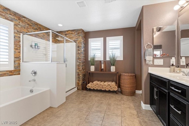 8013 Green River Knob St, Las Vegas, NV 89113 - full bathroom with a garden tub, vanity, a stall shower, and tile patterned floors