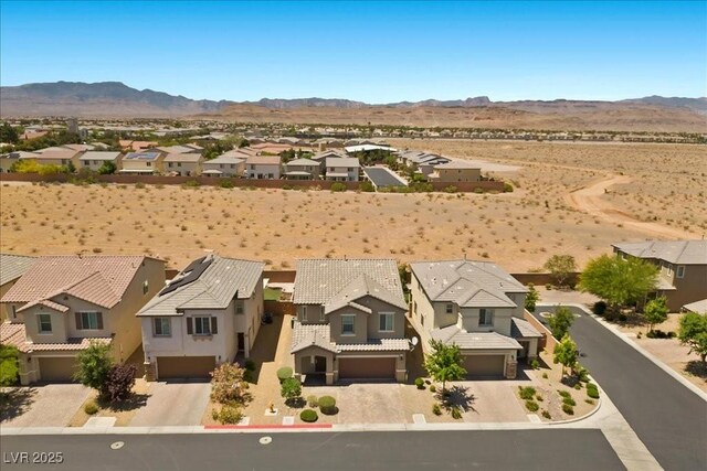8013 Green River Knob St, Las Vegas, NV 89113 - aerial perspective of suburban area with a mountain backdrop