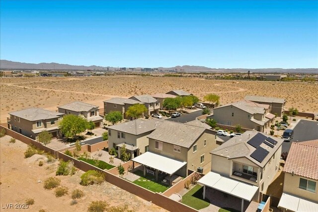8013 Green River Knob St, Las Vegas, NV 89113 - aerial view of residential area featuring a mountain backdrop and a desert landscape