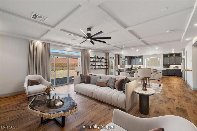 8753 Mann St, Las Vegas, NV 89139 - living area with coffered ceiling, a ceiling fan, light wood finished floors, recessed lighting, and beamed ceiling