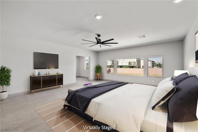 8753 Mann St, Las Vegas, NV 89139 - bedroom with light carpet, recessed lighting, and ceiling fan
