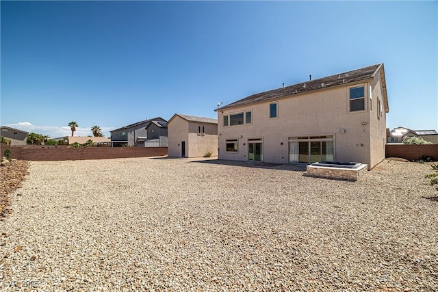 8753 Mann St, Las Vegas, NV 89139 - rear view of property with stucco siding