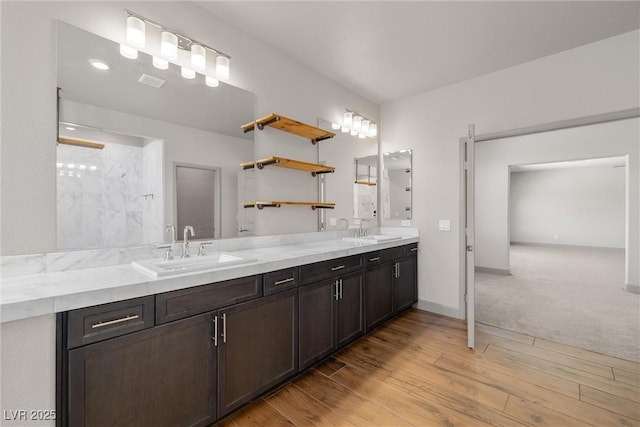 8753 Mann St, Las Vegas, NV 89139 - full bath with double vanity, wood finished floors, and a shower