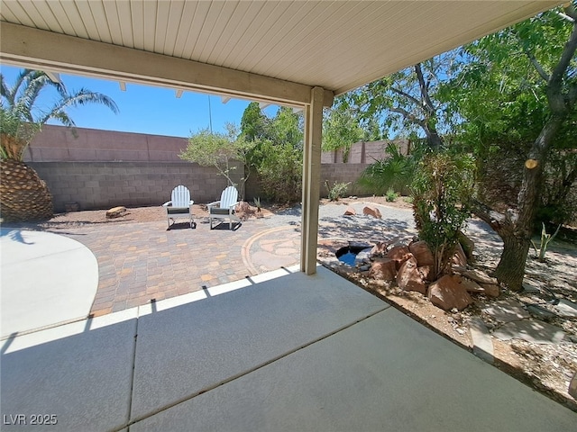 13 Desert Dawn Ln, Henderson, NV 89074 - fenced backyard featuring a patio