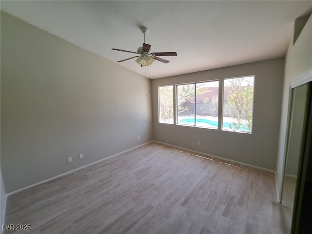13 Desert Dawn Ln, Henderson, NV 89074 - empty room featuring wood finished floors and ceiling fan
