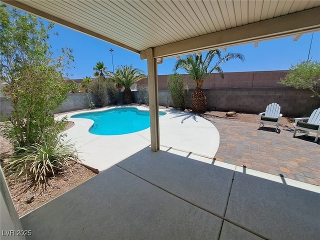 13 Desert Dawn Ln, Henderson, NV 89074 - view of swimming pool featuring a fenced backyard and a patio
