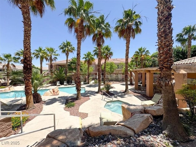 10553 Pine Glen Ave Unit 101, Las Vegas, NV 89144 - community pool with a patio area