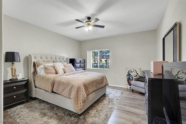 10553 Pine Glen Ave Unit 101, Las Vegas, NV 89144 - bedroom featuring wood finished floors and ceiling fan