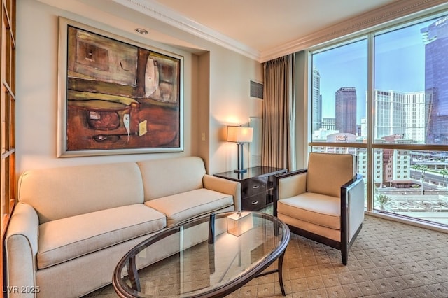 135 E Harmon Ave Unit 809, Las Vegas, NV 89109 - living area with healthy amount of natural light, crown molding, a city view, and carpet floors