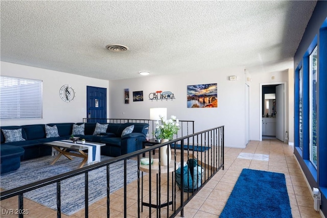 3030 Liberty Cir, Las Vegas, NV 89121 - living area featuring light tile patterned flooring and a textured ceiling