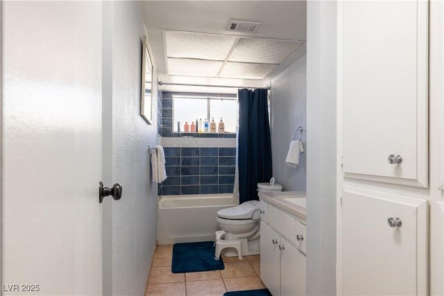 3030 Liberty Cir, Las Vegas, NV 89121 - bathroom with tile patterned flooring, shower / bathtub combination with curtain, and vanity