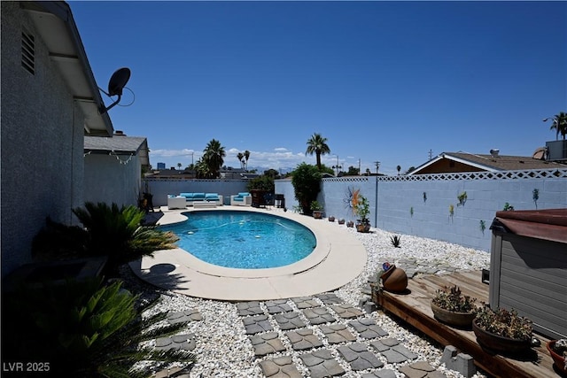 3030 Liberty Cir, Las Vegas, NV 89121 - view of swimming pool with an outdoor living space, a fenced backyard, and a patio area