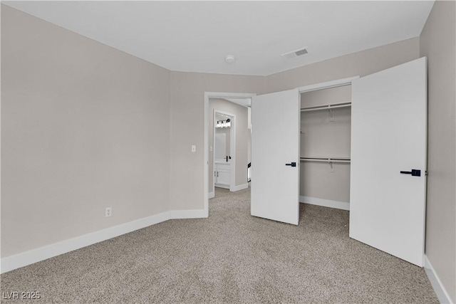 8379 Drop Camp St, Las Vegas, NV 89123 - unfurnished bedroom with carpet flooring, a spacious closet, and a closet