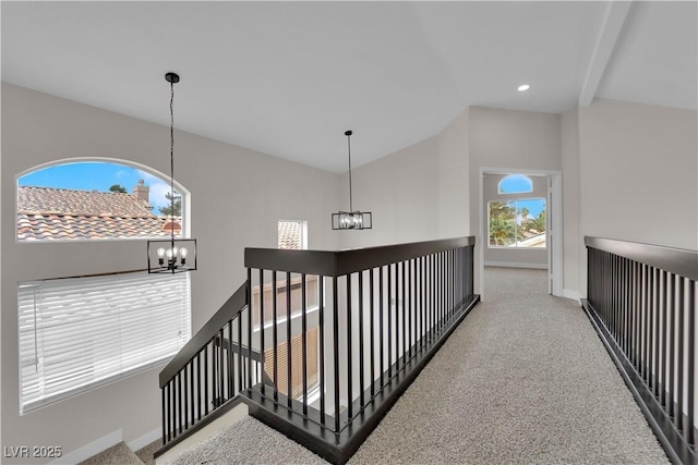 8379 Drop Camp St, Las Vegas, NV 89123 - hallway with a chandelier, an upstairs landing, carpet, lofted ceiling, and recessed lighting