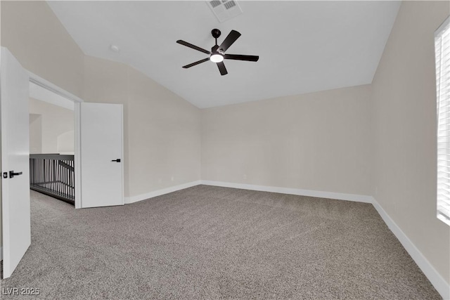 8379 Drop Camp St, Las Vegas, NV 89123 - carpeted empty room with vaulted ceiling, ceiling fan, and healthy amount of natural light