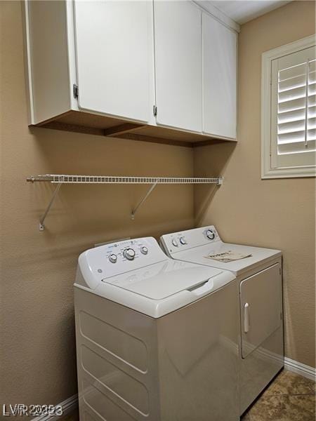 5110 Silenzio St, Las Vegas, NV 89135 - laundry room with washing machine and clothes dryer and cabinet space