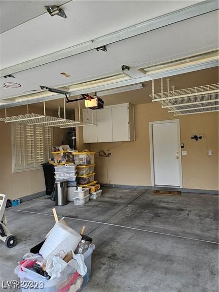 5110 Silenzio St, Las Vegas, NV 89135 - garage with a garage door opener