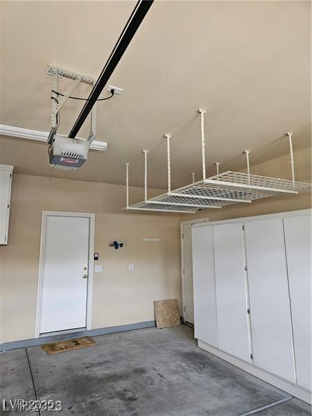 5110 Silenzio St, Las Vegas, NV 89135 - garage with a garage door opener