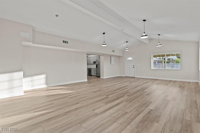 1628 Izabella Ave, Las Vegas, NV 89169 - unfurnished living room with light wood-style floors and baseboards