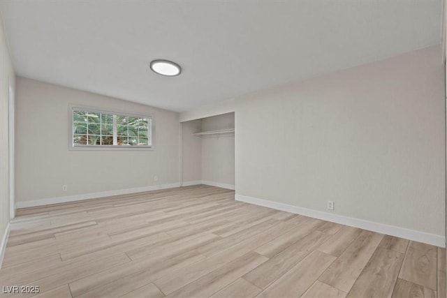 1628 Izabella Ave, Las Vegas, NV 89169 - unfurnished bedroom featuring light wood finished floors and a closet