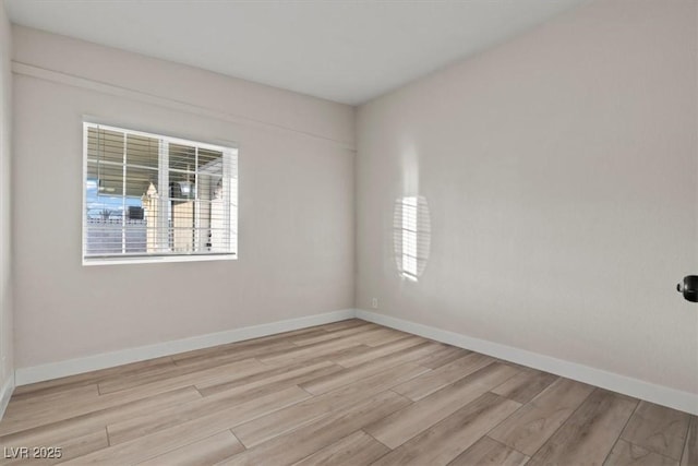1628 Izabella Ave, Las Vegas, NV 89169 - spare room with light wood-type flooring