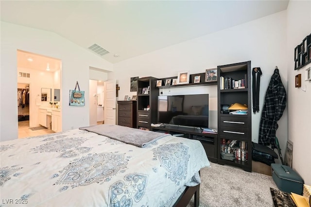 4364 Contour Bend Ave, North Las Vegas, NV 89084 - bedroom featuring vaulted ceiling, carpet, and ensuite bathroom