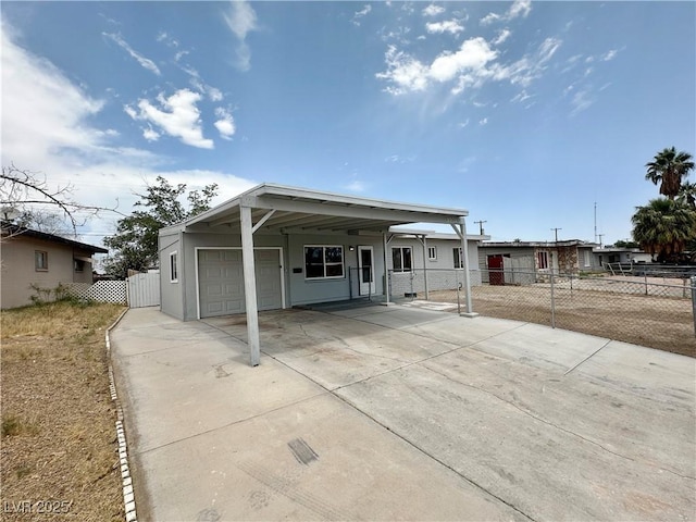 4924 Carmen Blvd, Las Vegas, NV 89108 - view of front of property with concrete driveway, a carport, and an attached garage
